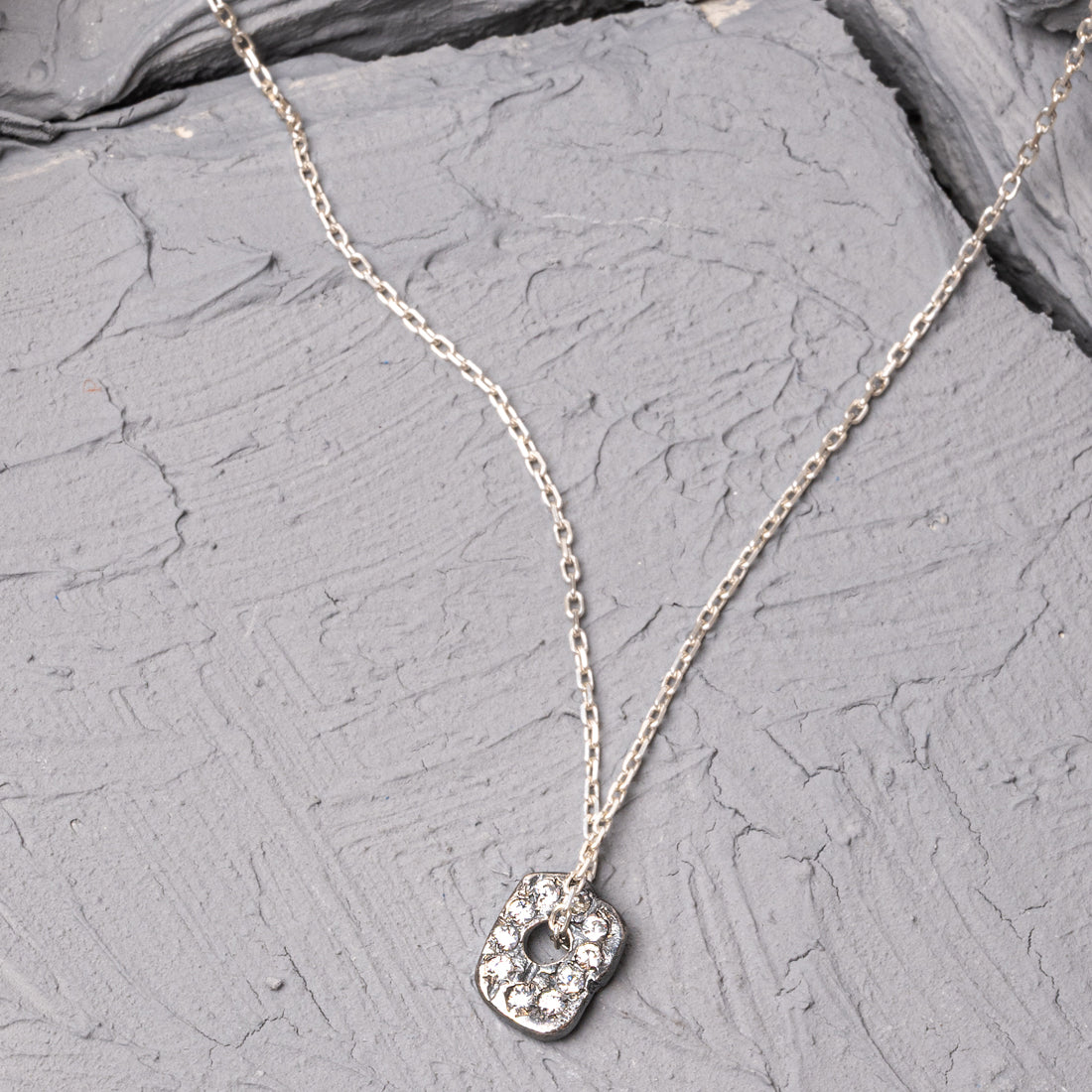 Ribbon Silver Necklace with White Zircon Stone